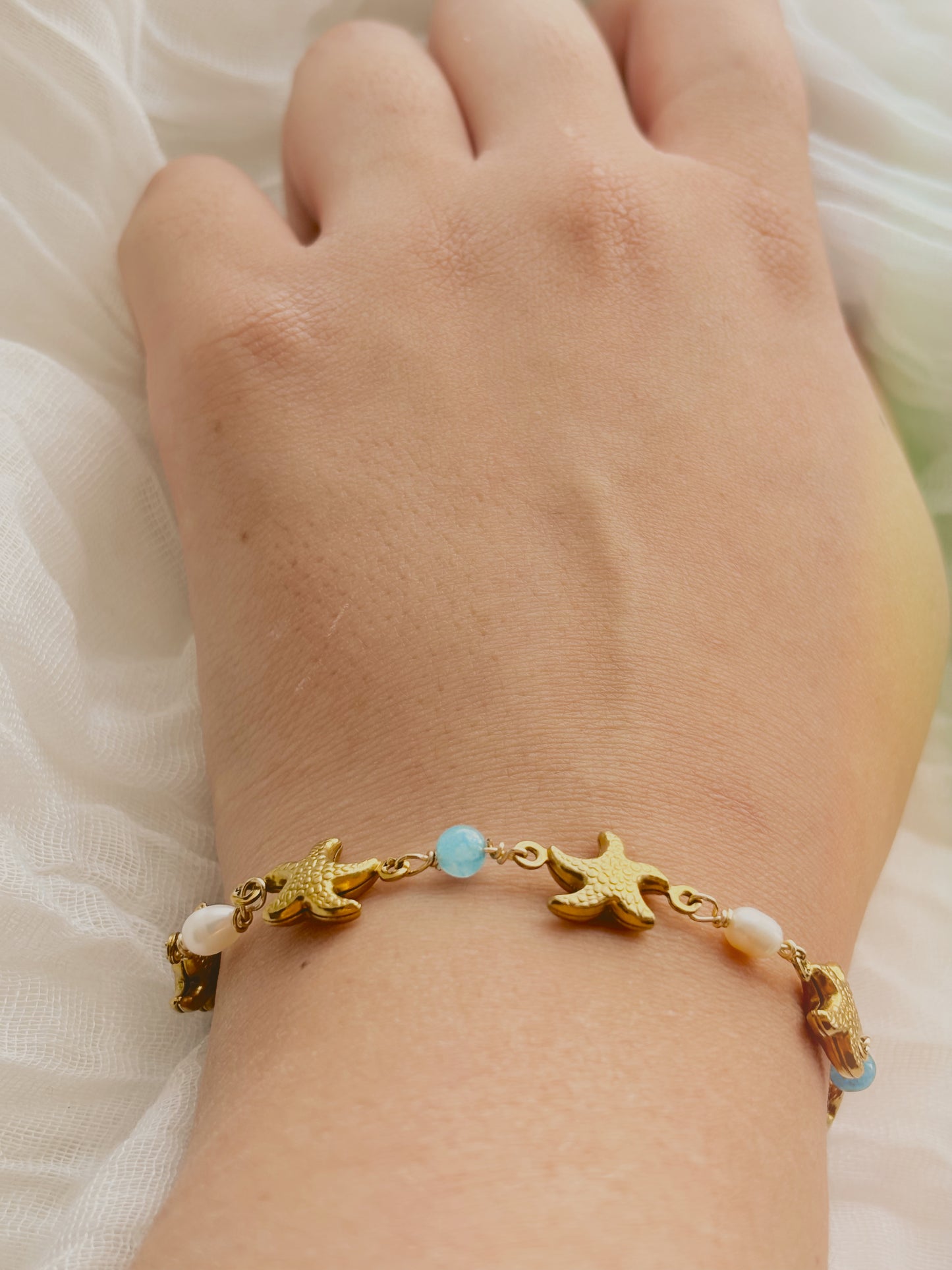 Ocean inspired bracelet with starfish, freshwater pearls & aquamarine - tarnish free - gold & silver - handmade