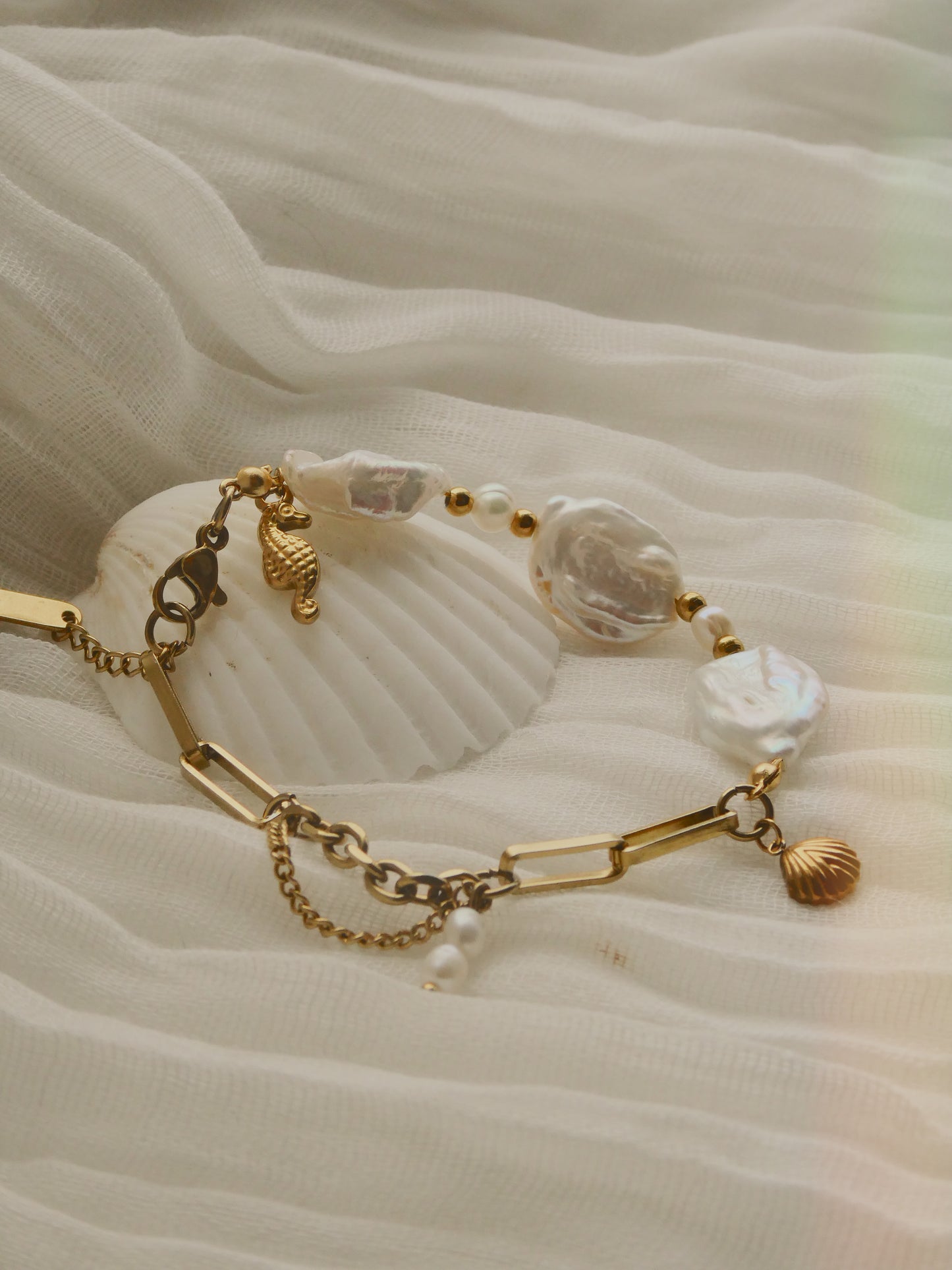 Unique Fresh water pearl & charm bracelet