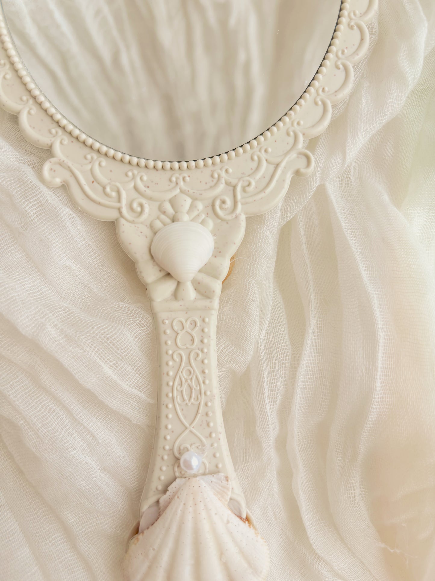 hand held mirror - hand crafted design with shells