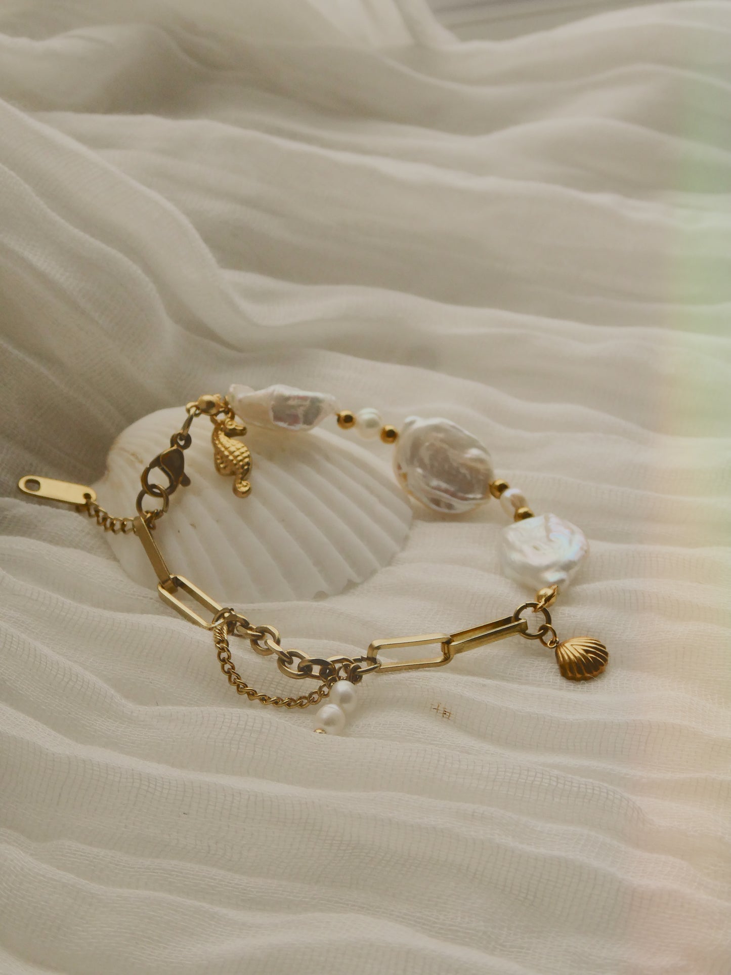Unique Fresh water pearl & charm bracelet