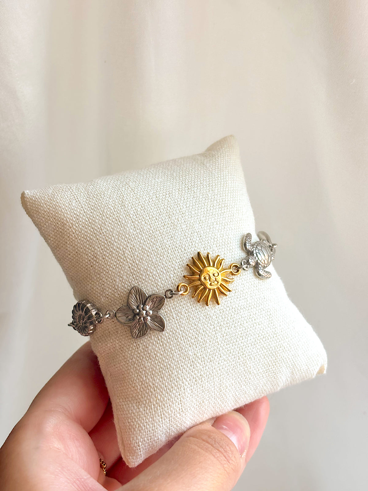 Mixed metal coastal charm bracelet