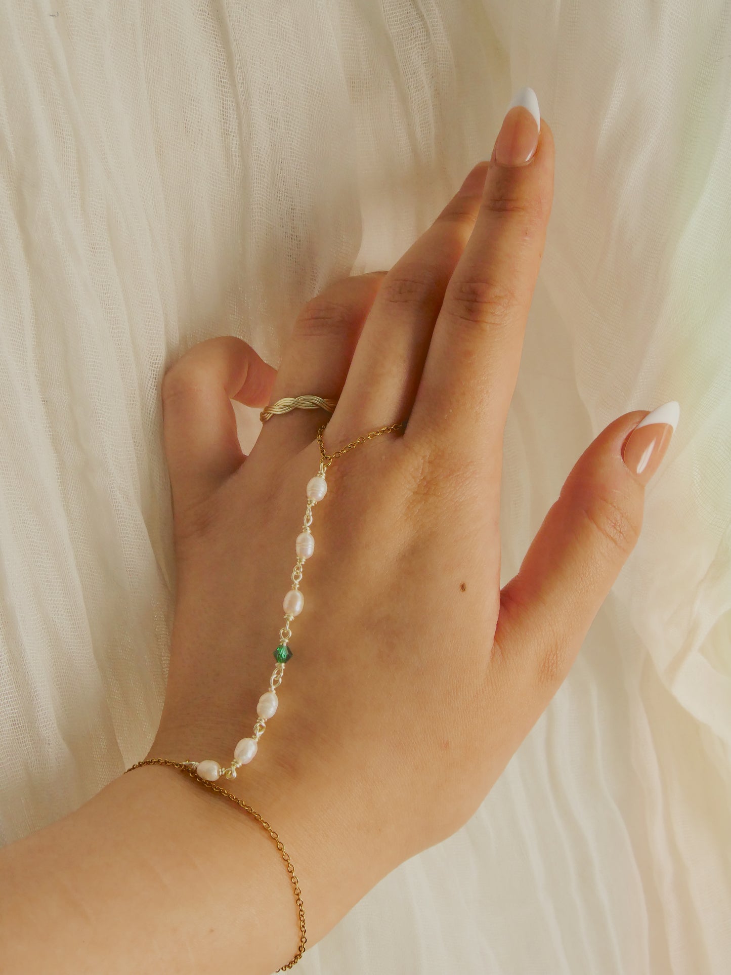 Custom pearl and gem hand chain