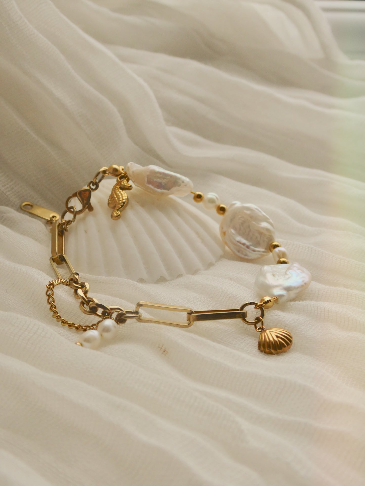 Unique Fresh water pearl & charm bracelet