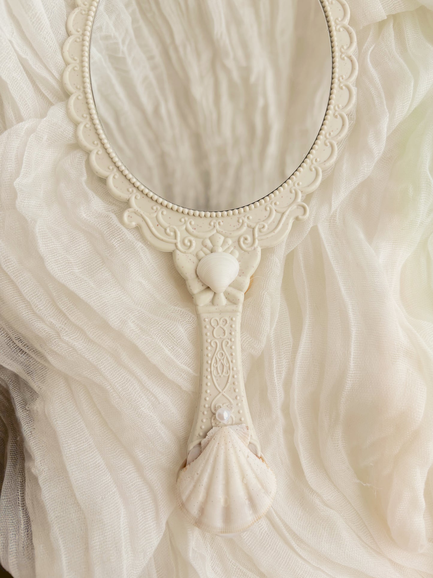hand held mirror - hand crafted design with shells