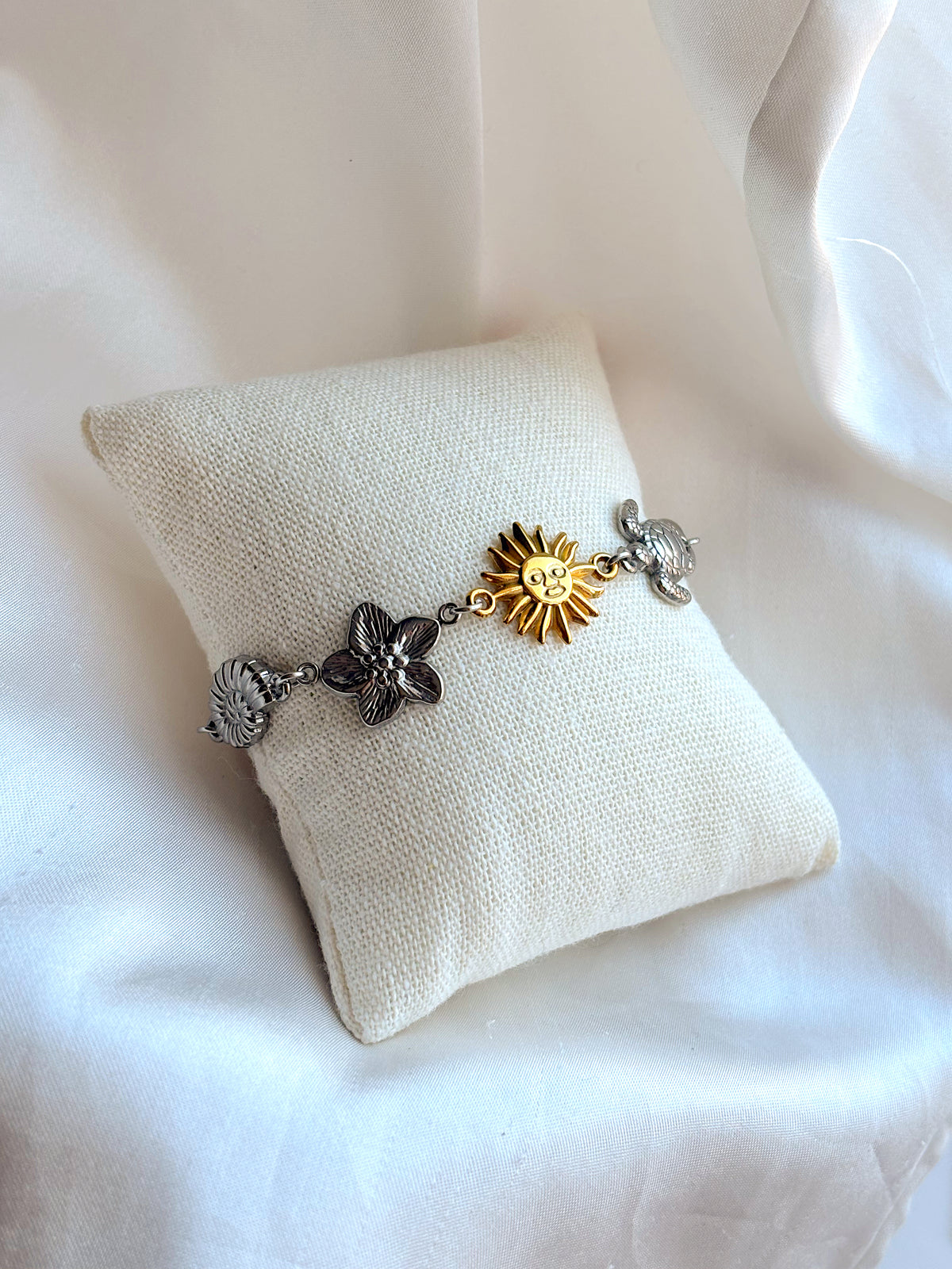 Mixed metal coastal charm bracelet