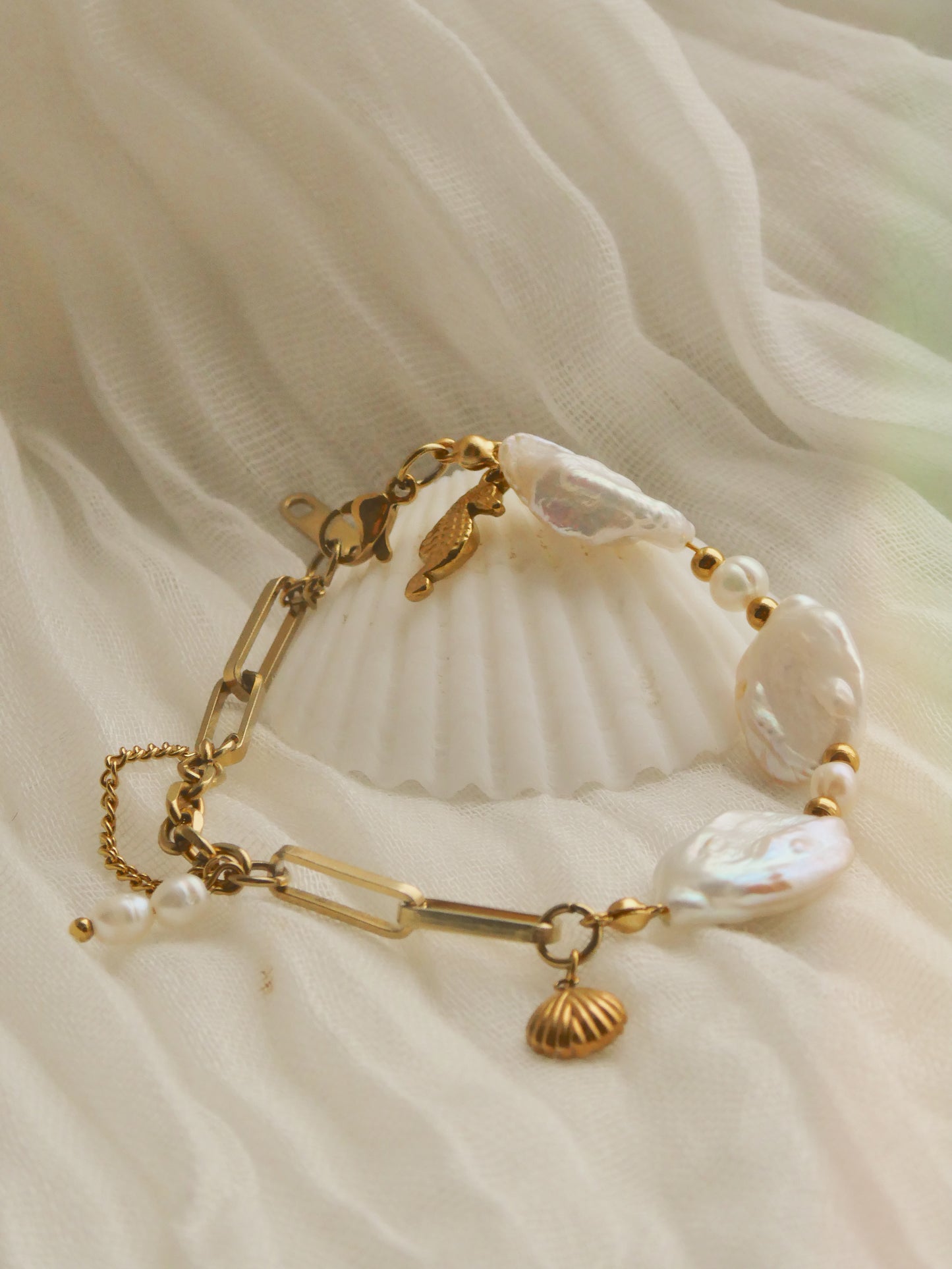 Unique Fresh water pearl & charm bracelet