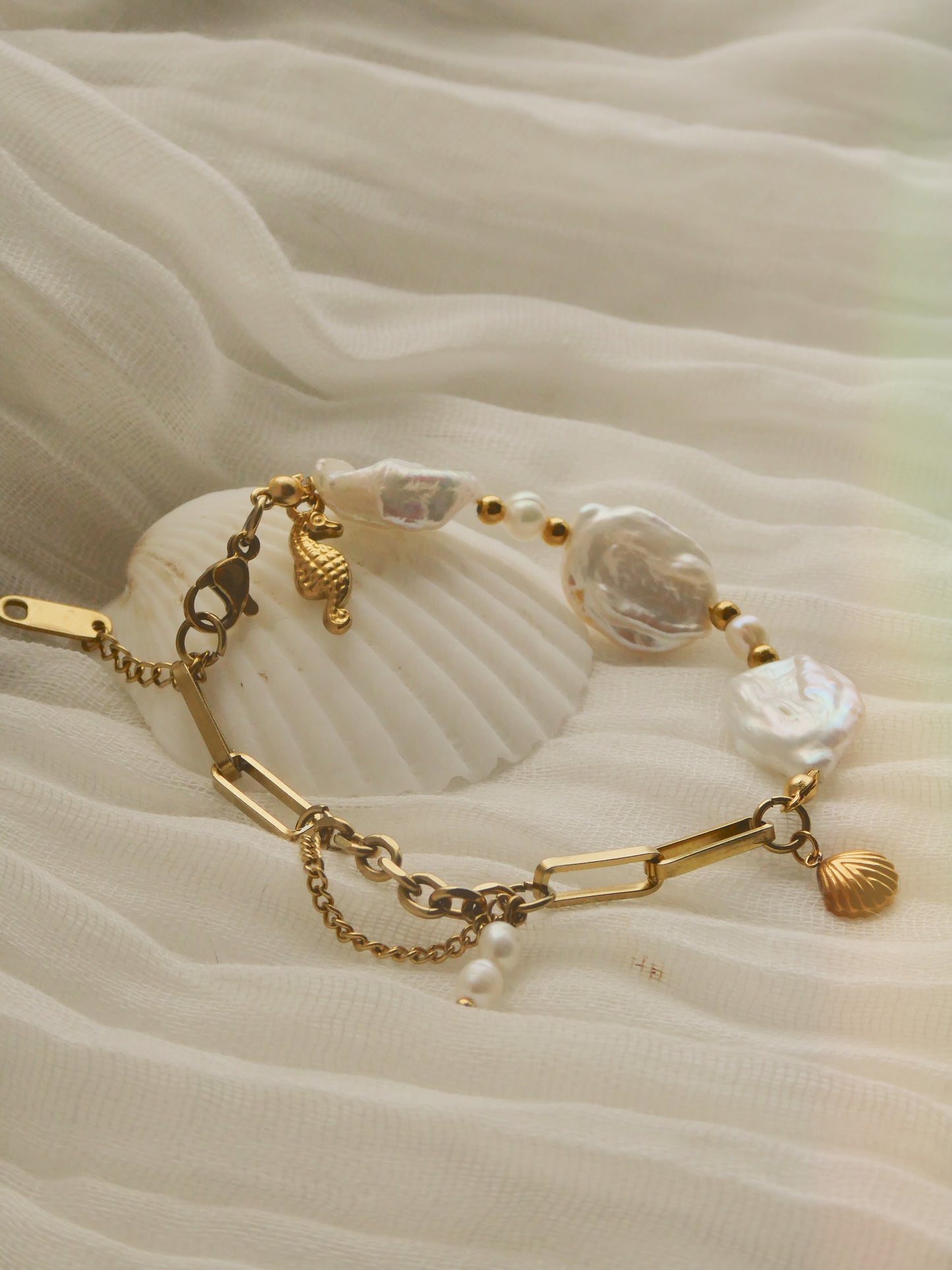 Unique Fresh water pearl & charm bracelet