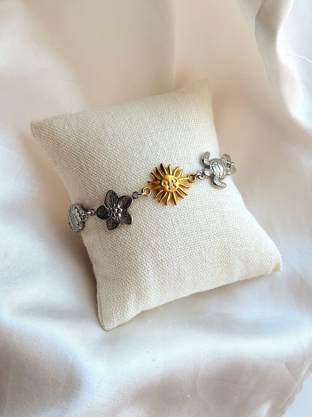 Mixed metal coastal charm bracelet