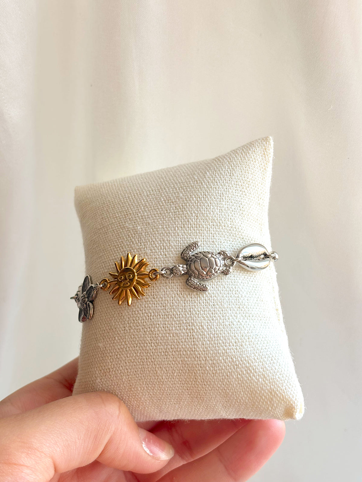 Mixed metal coastal charm bracelet