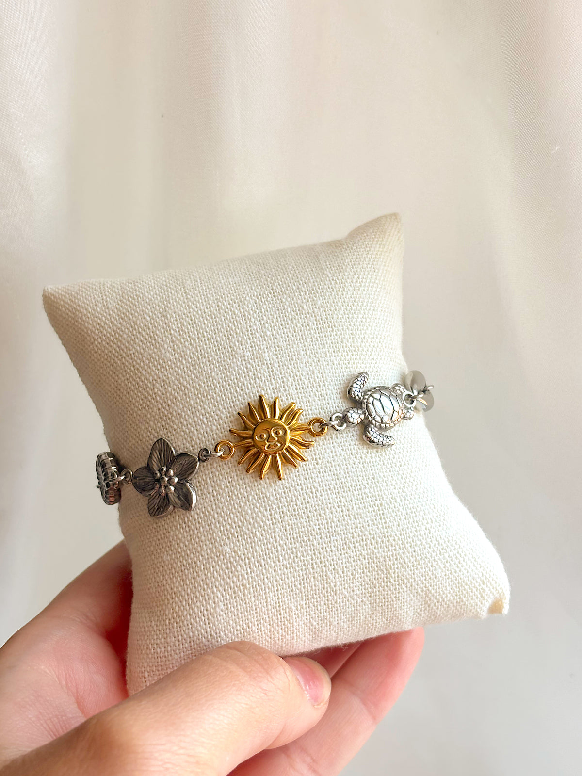 Mixed metal coastal charm bracelet