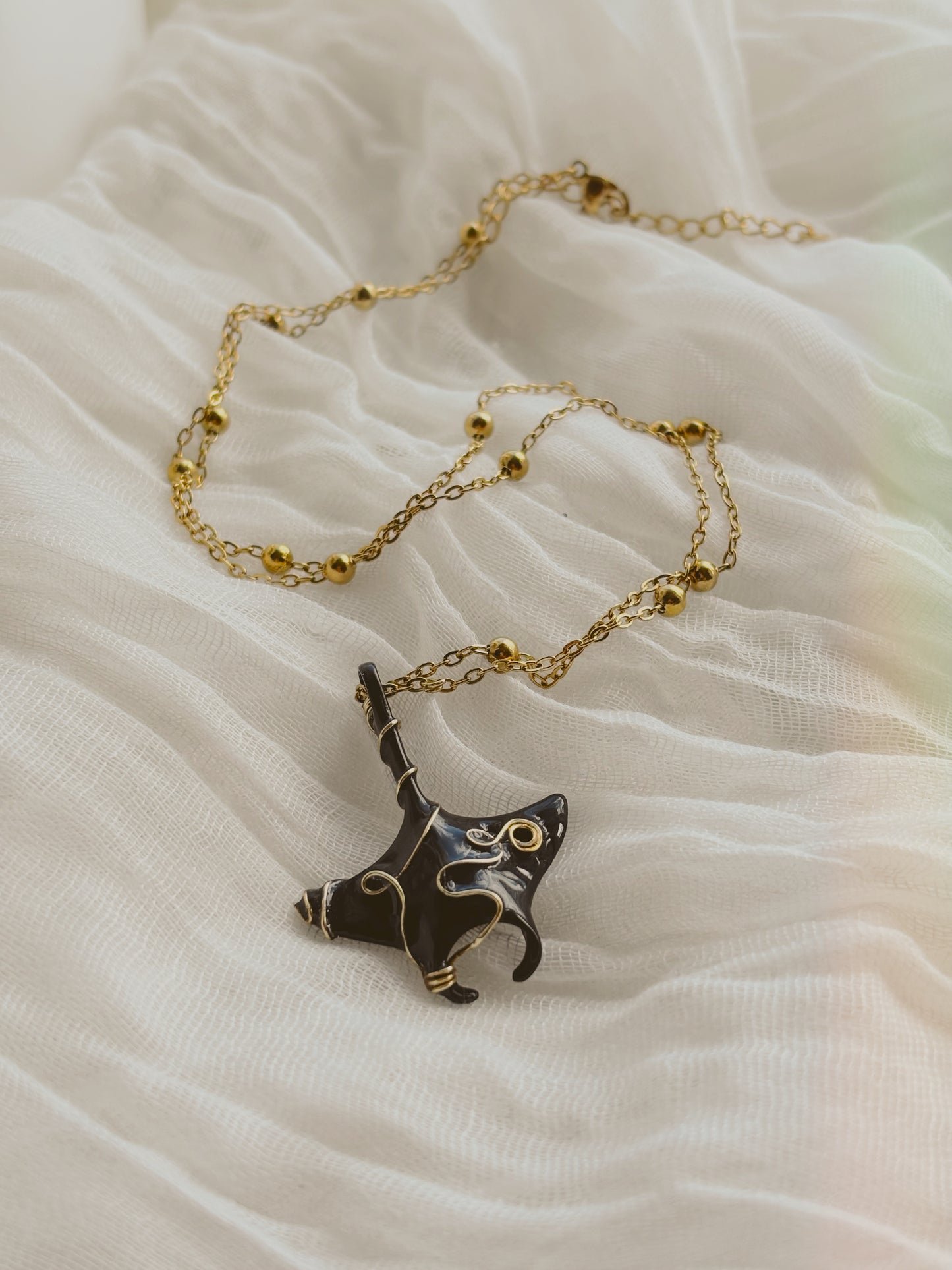 Black manta ray with wire detailing - tarnish free - gold & silver - handmade