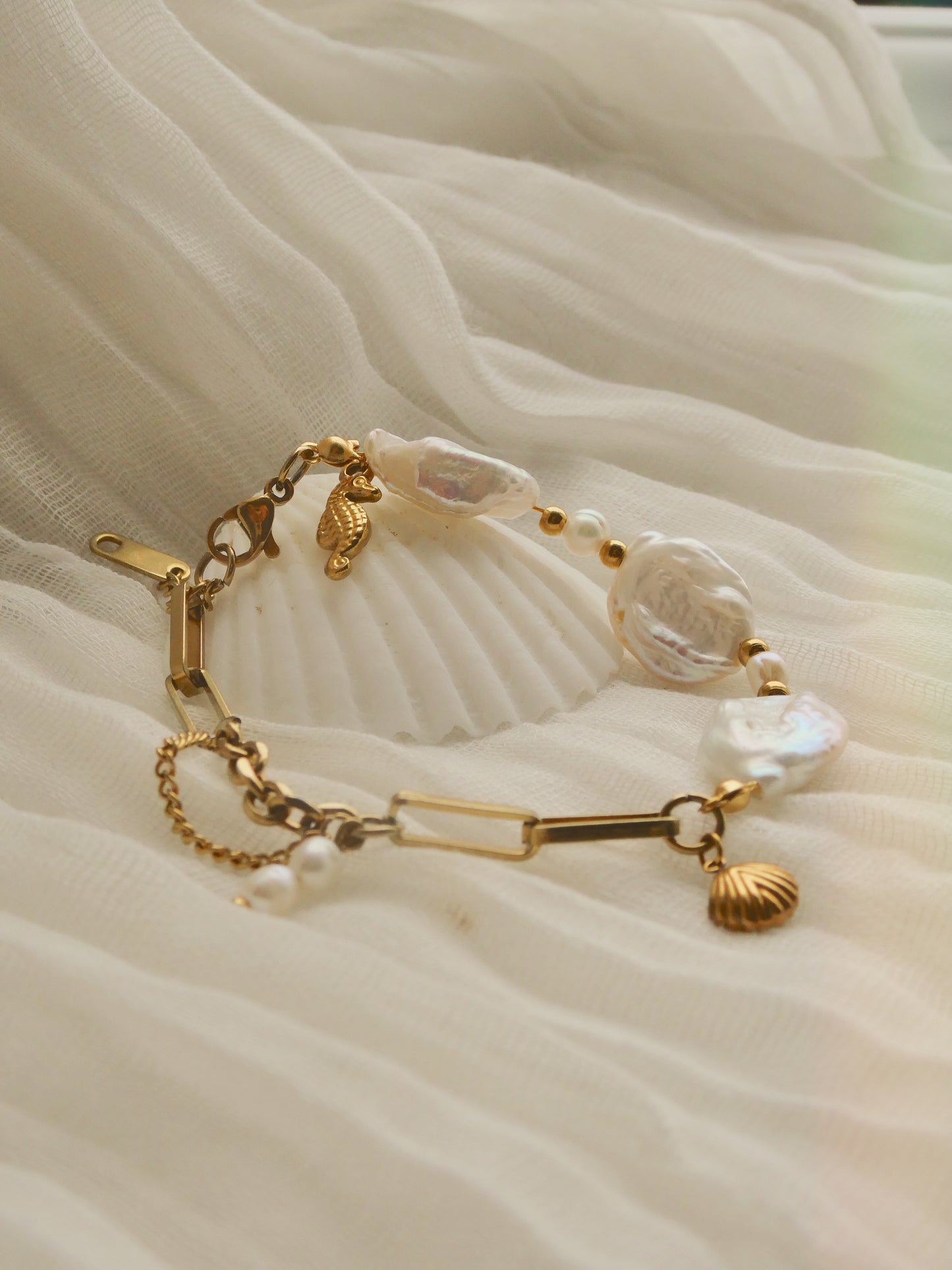 Unique Fresh water pearl & charm bracelet