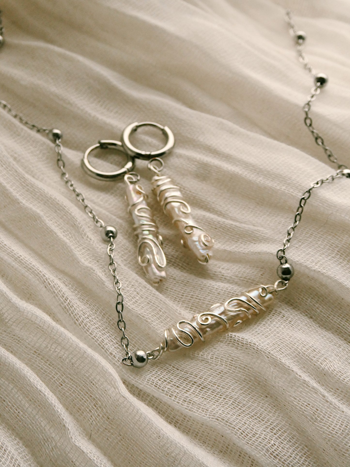 Detailed wire wrapped fresh water pearl necklace & earrings set