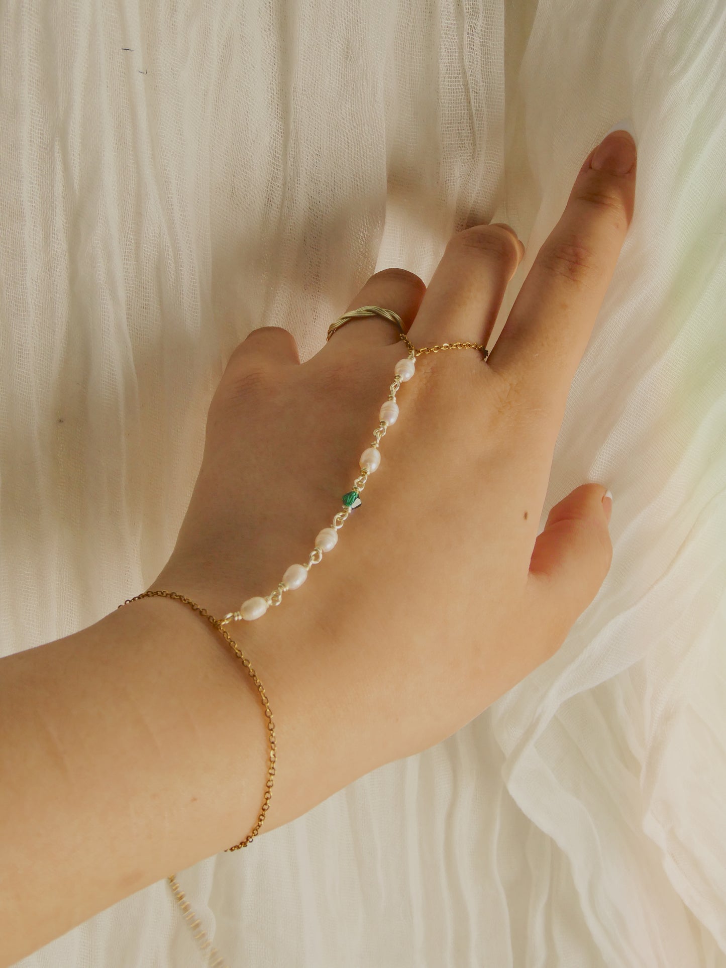 Custom pearl and gem hand chain